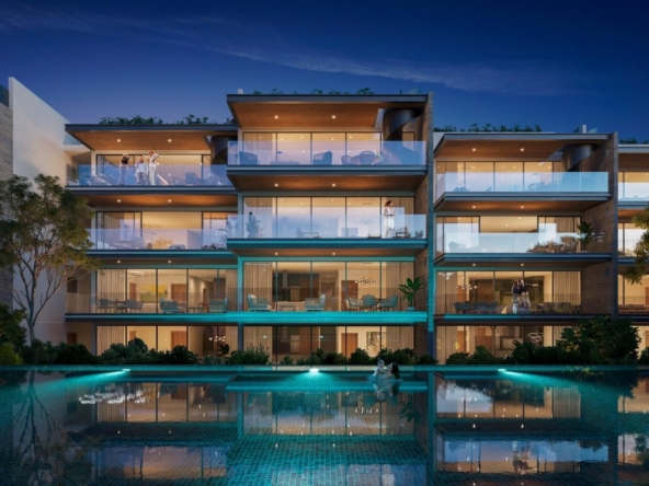 a building with a pool and people in front of it