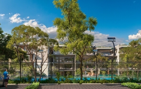 a building with trees and a pool