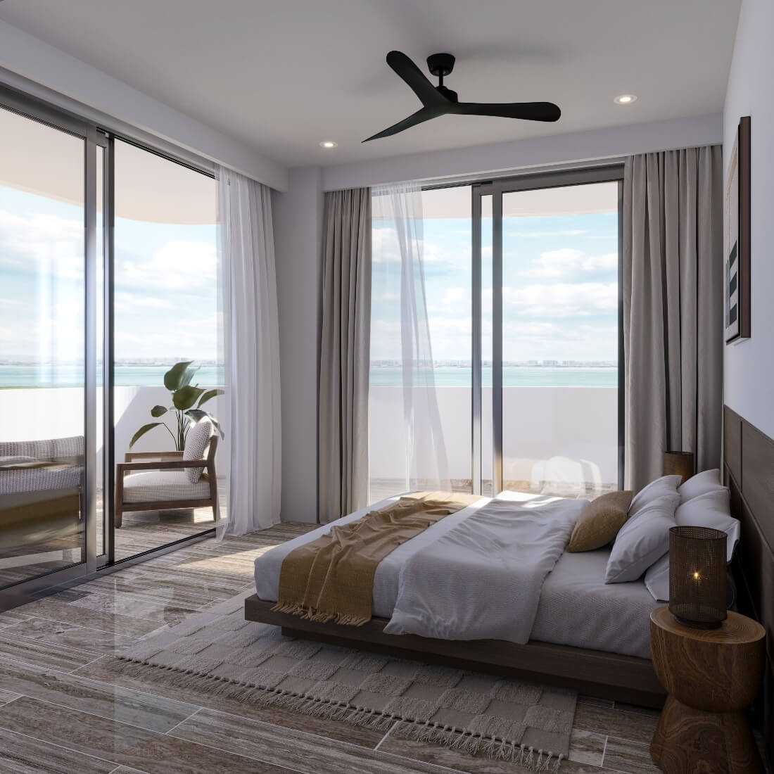 a bedroom with a large window overlooking the ocean